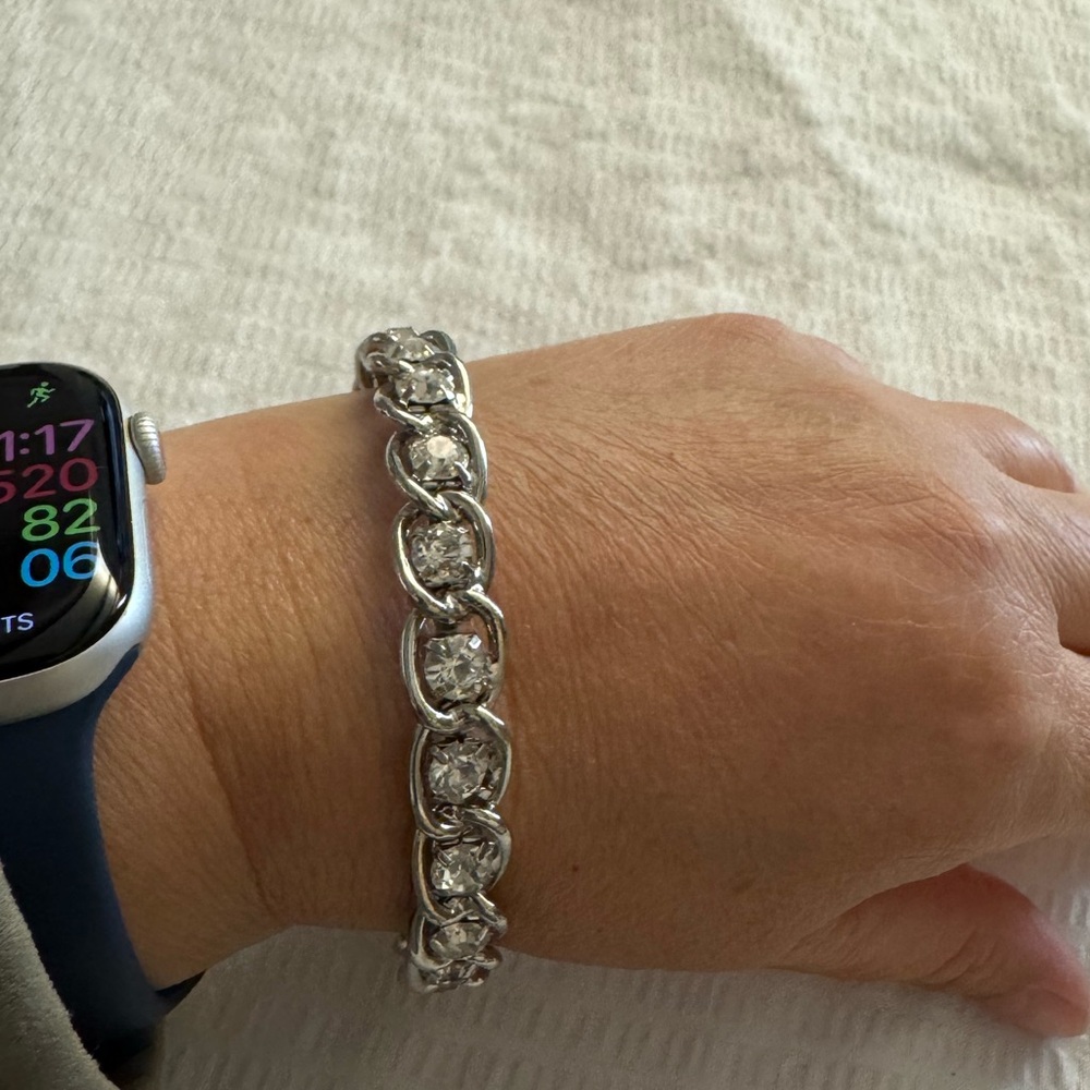 Beautiful silver tone bangle with sparkly rhinestones
